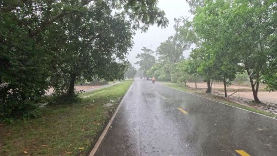 Bike. Cambodia. Siem Reap. Rain. Day. 2023. Rear POV