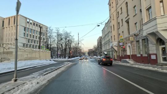 Car. Russia. Moscow. Win. Feb. Day. 2024. Rear POV